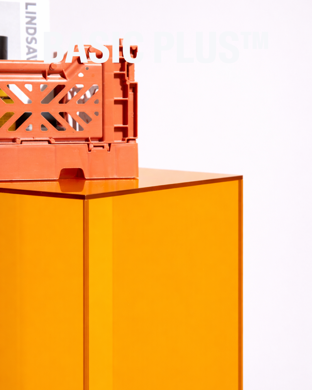 Transparent amber acrylic display plinth alternate angle