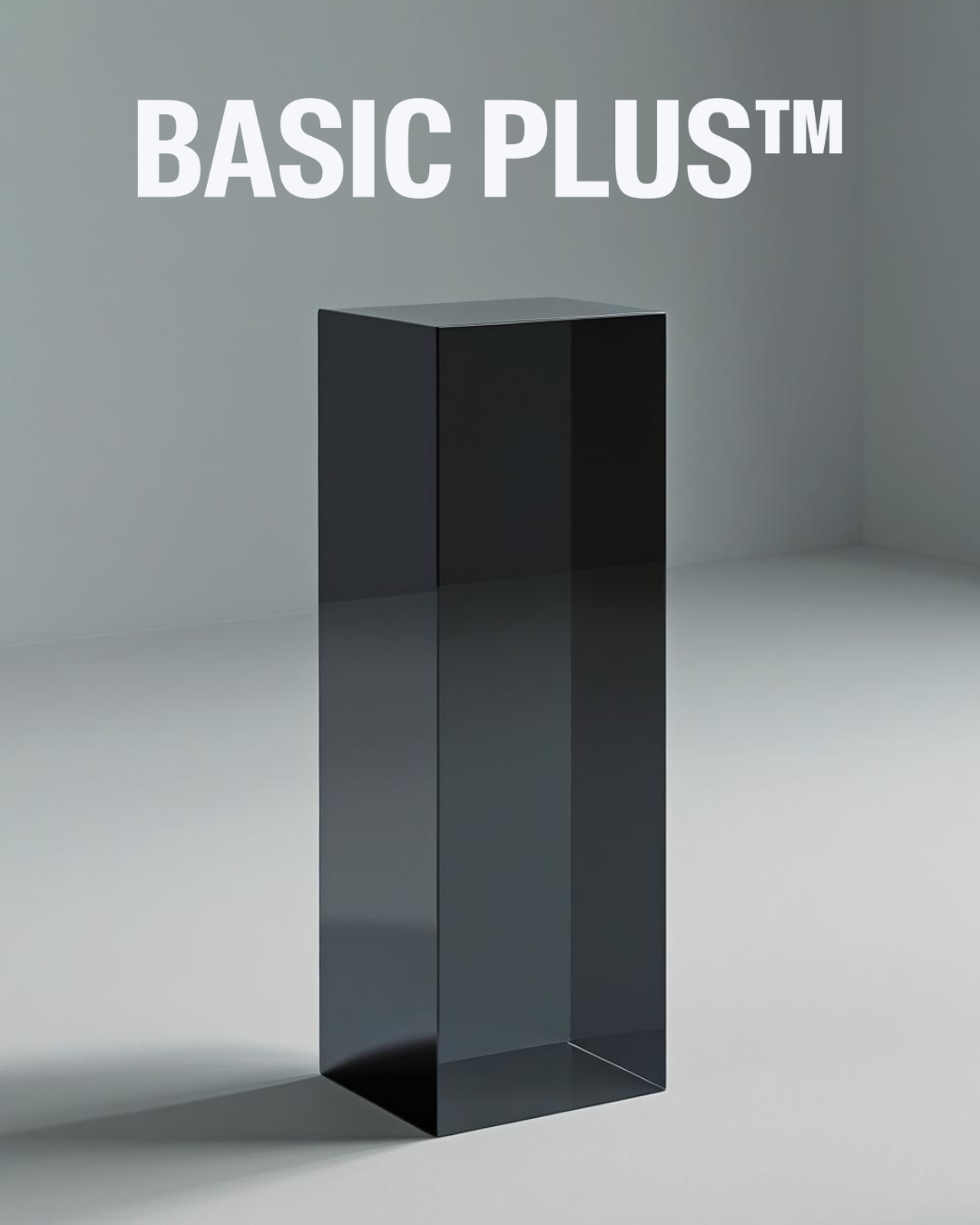 Transparent dark grey acrylic display plinth on a neutral background