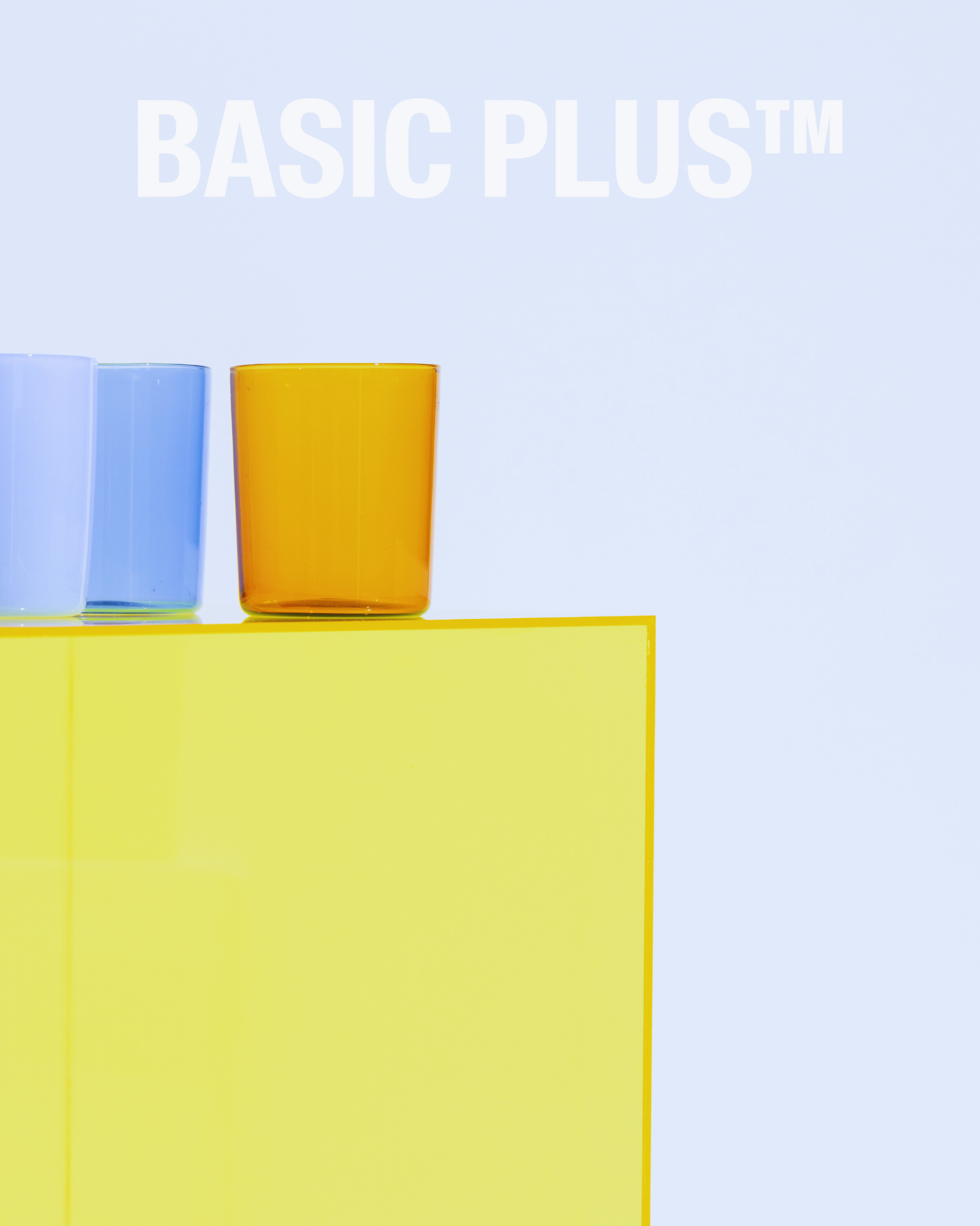 Transparent yellow acrylic display plinth side view
